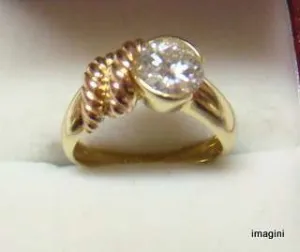 inel din aur galben de 18k. cu un diamant de 1, 5ct.