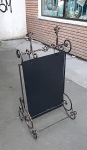 Panou stardal publicitar din fier forjat.