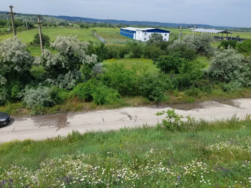 Teren Intravilan stradal DE 70 Isalnita, langa pensiune - Imaginea 7